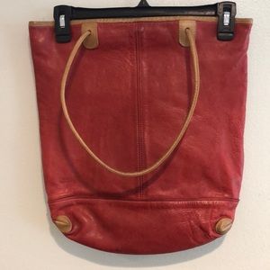 Red and beige, leather purse black lining magnetic button to close